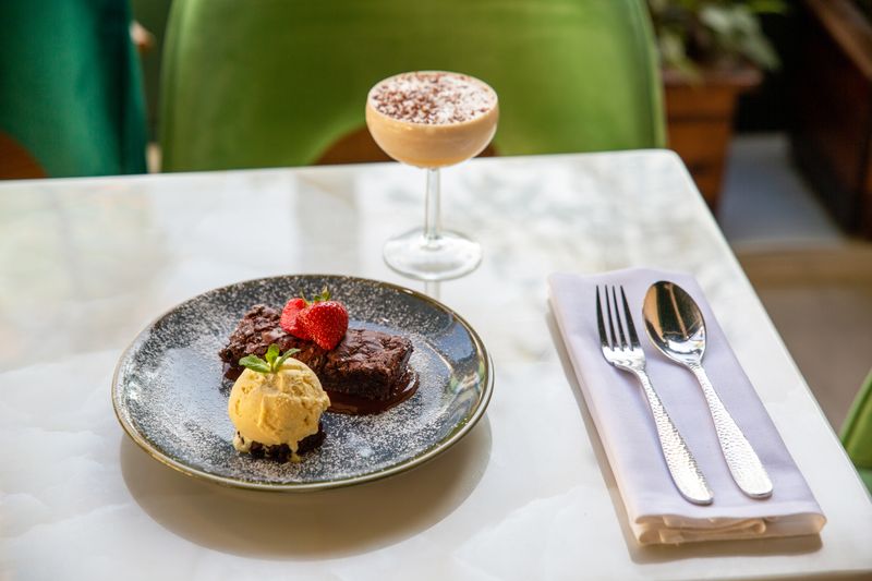 Warm chocolate brownie dessert with ice cream